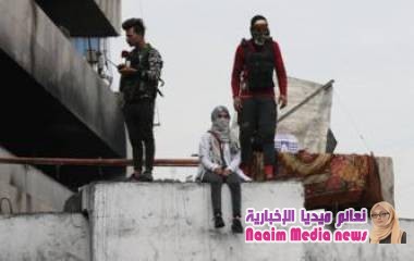 مظاهرات العراق: تعليق جثة شاب على عمود وسط بغداد يثير جدلا واحتجاجات